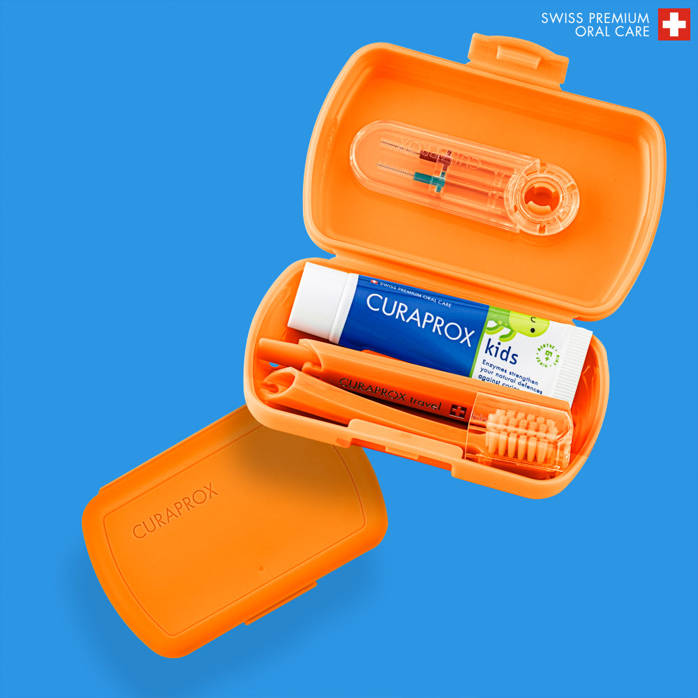Curaprox Travel Set Kids orange, travel toothbrush, interdental brush, toothpaste 10ml, travel box