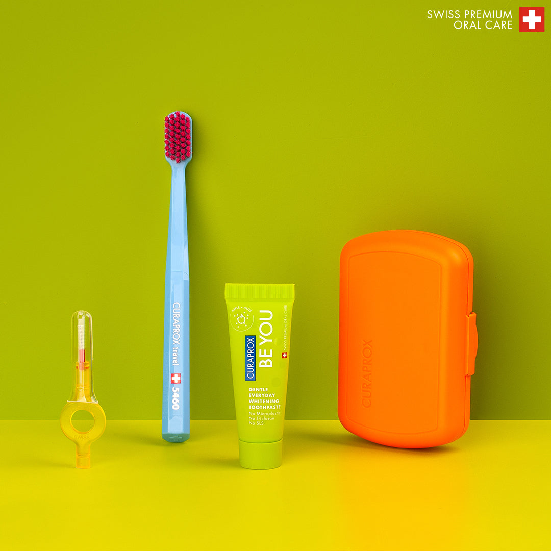 Curaprox Travel Set orange, travel toothbrush, interdental brush, toothpaste 10ml, travel box