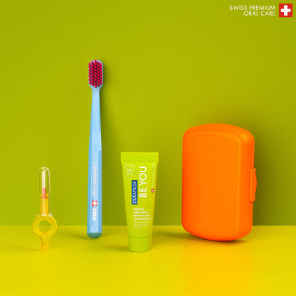 Curaprox Travel Set orange, travel toothbrush, interdental brush, toothpaste 10ml, travel box
